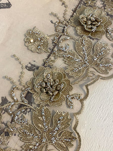 Gold Glittered Lace. Gold on champagne netting with applique roses